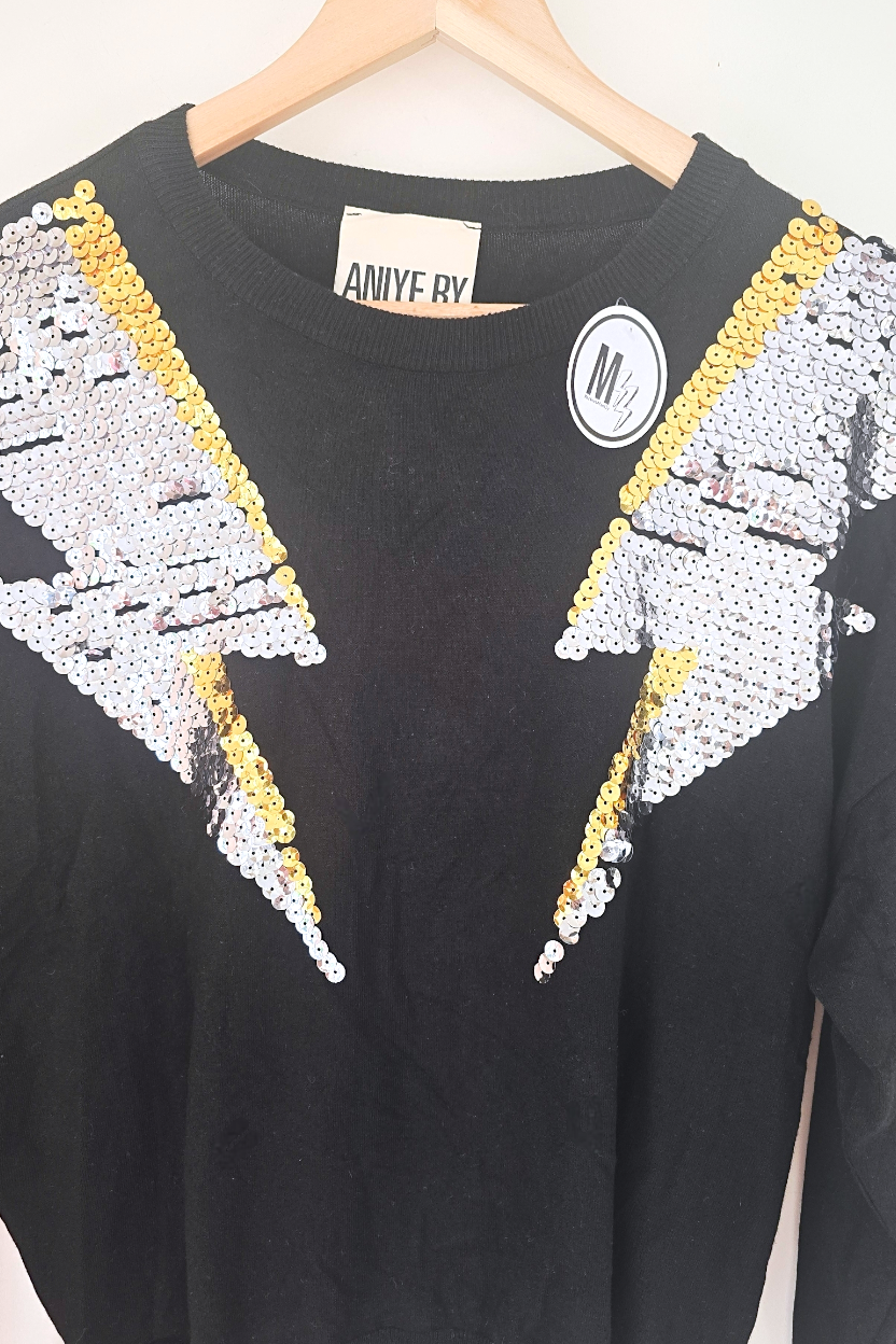 Pull noir éclairs sequins