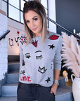 Pull gris à écussons - 𝐌𝐚𝐫𝐢𝐧𝐚𝟒𝟒𝐟𝐚𝐦𝐢𝐥𝐲