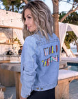 Veste en jean avec inscriptions perlées au dos - 𝐌𝐚𝐫𝐢𝐧𝐚𝟒𝟒𝐟𝐚𝐦𝐢𝐥𝐲