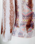 Veste cintrée tie and dye munie de strass au dos.