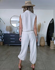 Ensemble beige haut + pantalon à bandes latérales
