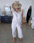 Ensemble beige haut + pantalon à bandes latérales
