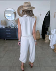 Ensemble beige haut + pantalon à bandes latérales