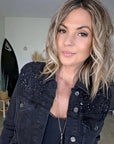 Veste en jean noire perlée