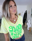 T-shirt jaune à inscription fluo