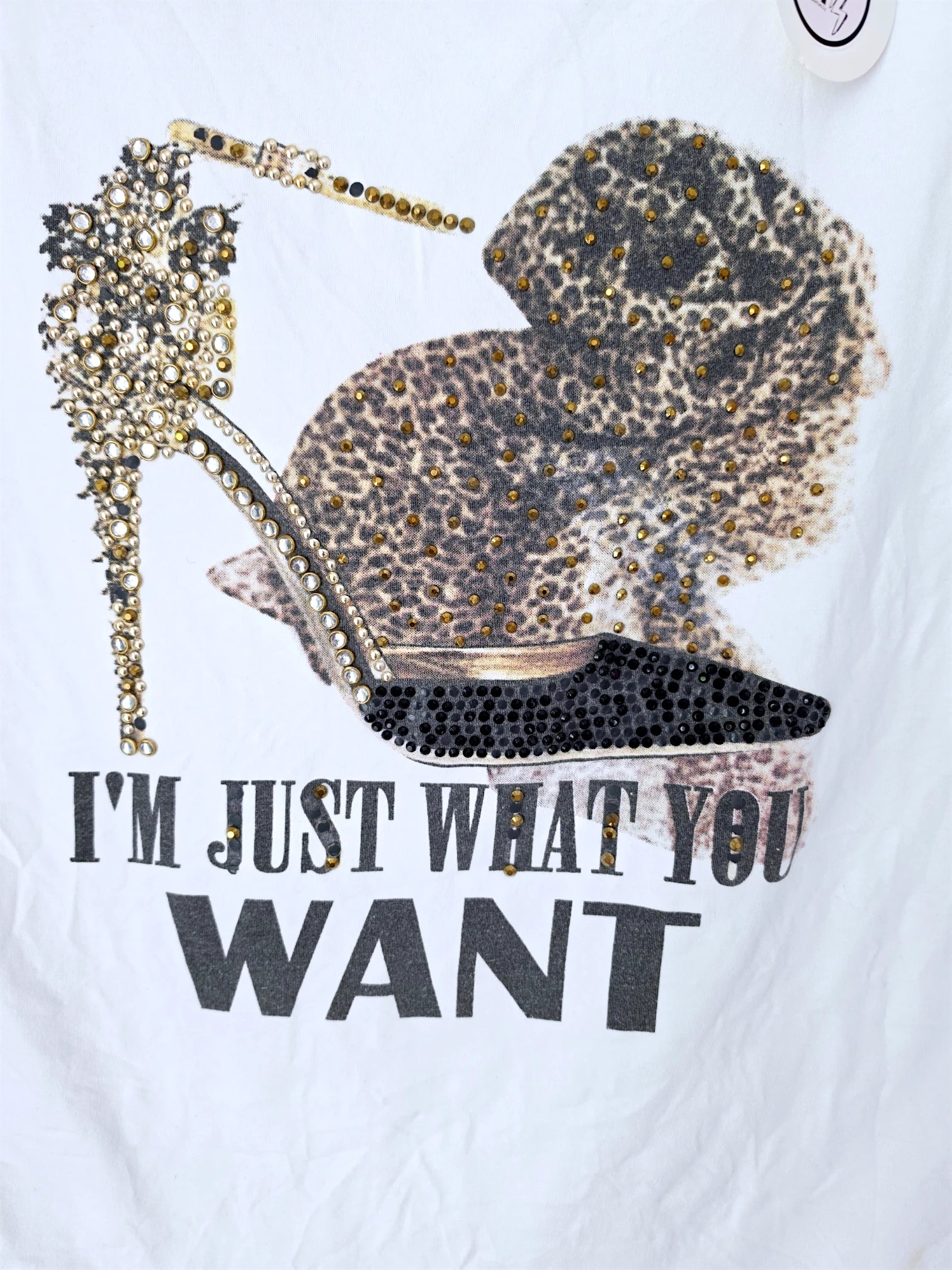 T-shirt blanc à inscriptions muni de strass.