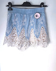 Short bicolore ajouré