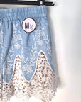 Short bicolore ajouré