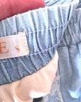 Short bicolore ajouré