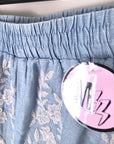 Short bicolore ajouré