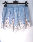 Short bicolore ajouré