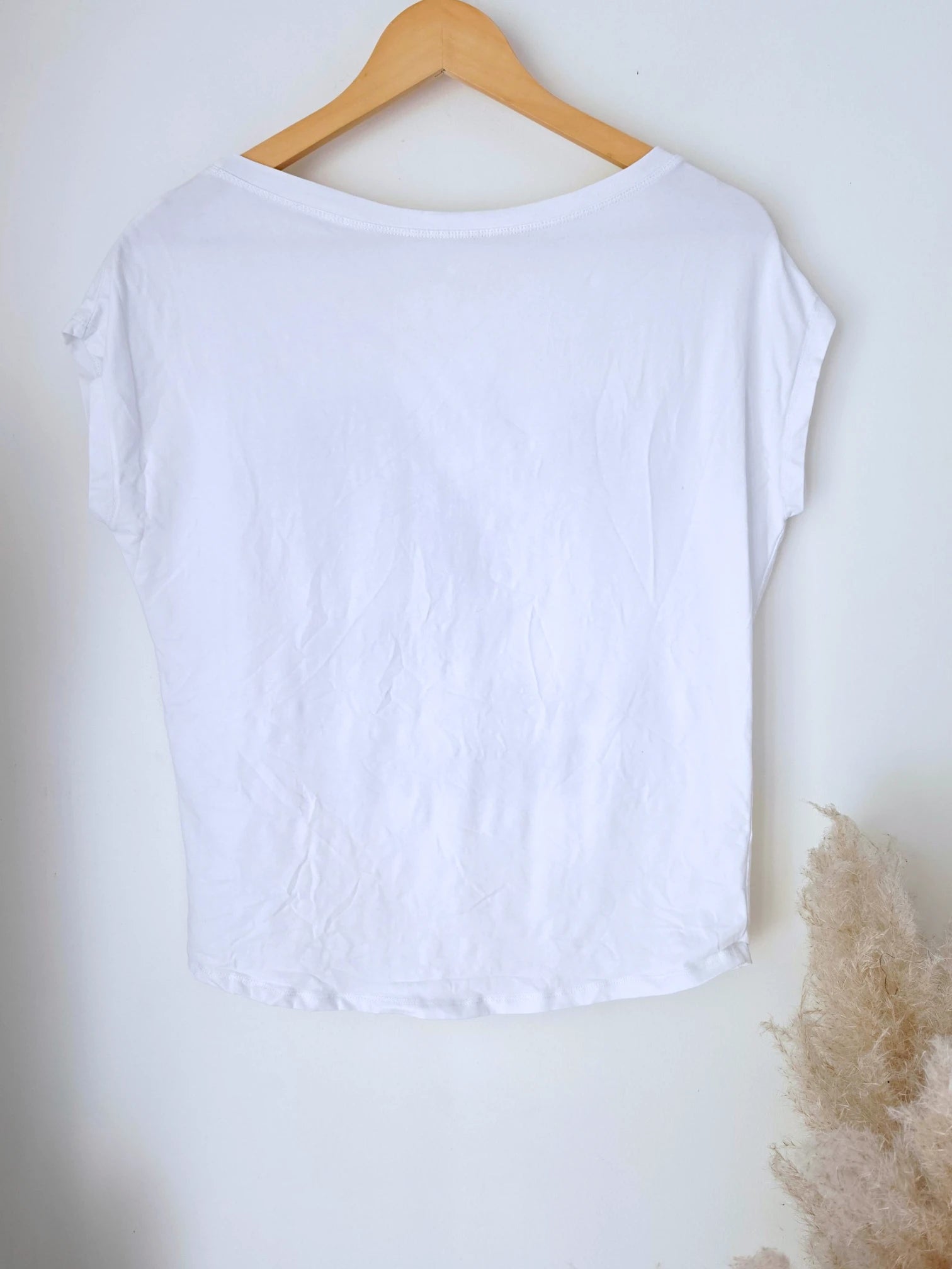 T-shirt blanc à inscriptions muni de strass.
