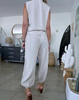 Ensemble beige haut + pantalon à bandes latérales