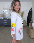 Veste beige à tags et inscriptions fluo