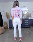 Chemise rayée rose à inscription au dos