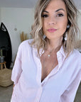 Chemise rayée rose à inscription au dos