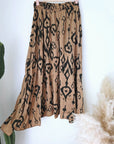 Jupe beige à imprimé noir
