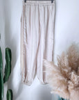 Ensemble beige haut + pantalon à bandes latérales