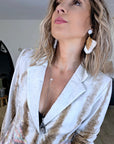Veste cintrée tie and dye munie de strass au dos.