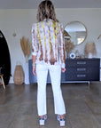 Veste cintrée tie and dye munie de strass au dos.