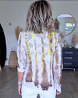 Veste cintrée tie and dye munie de strass au dos.