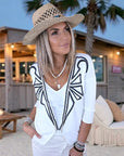 Cardigan blanc à encolure en V profonde