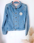 Veste en jean à inscriptions en perles