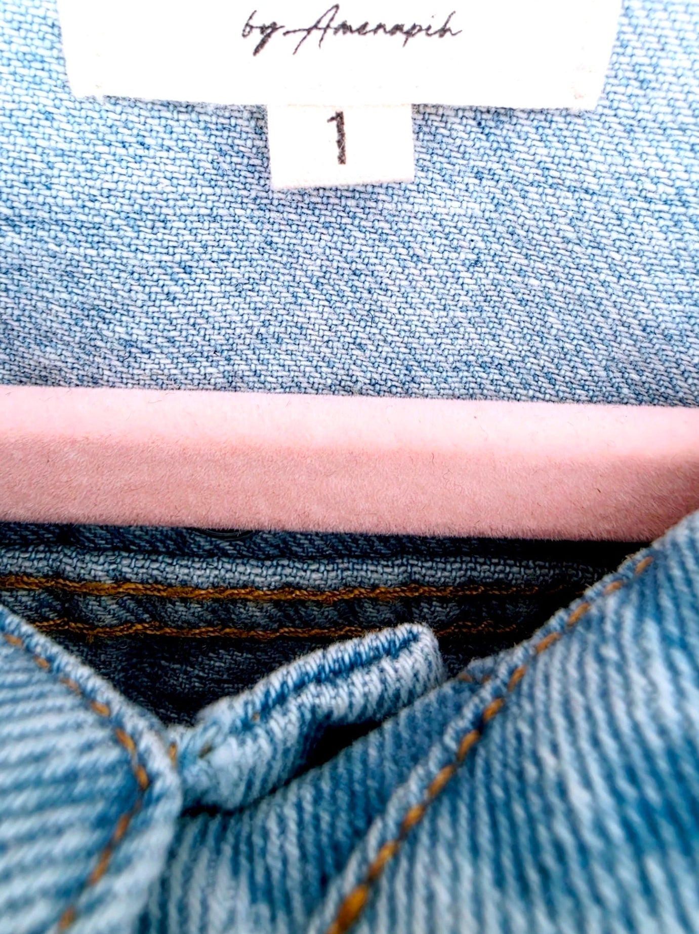 Veste en jean à inscriptions en perles