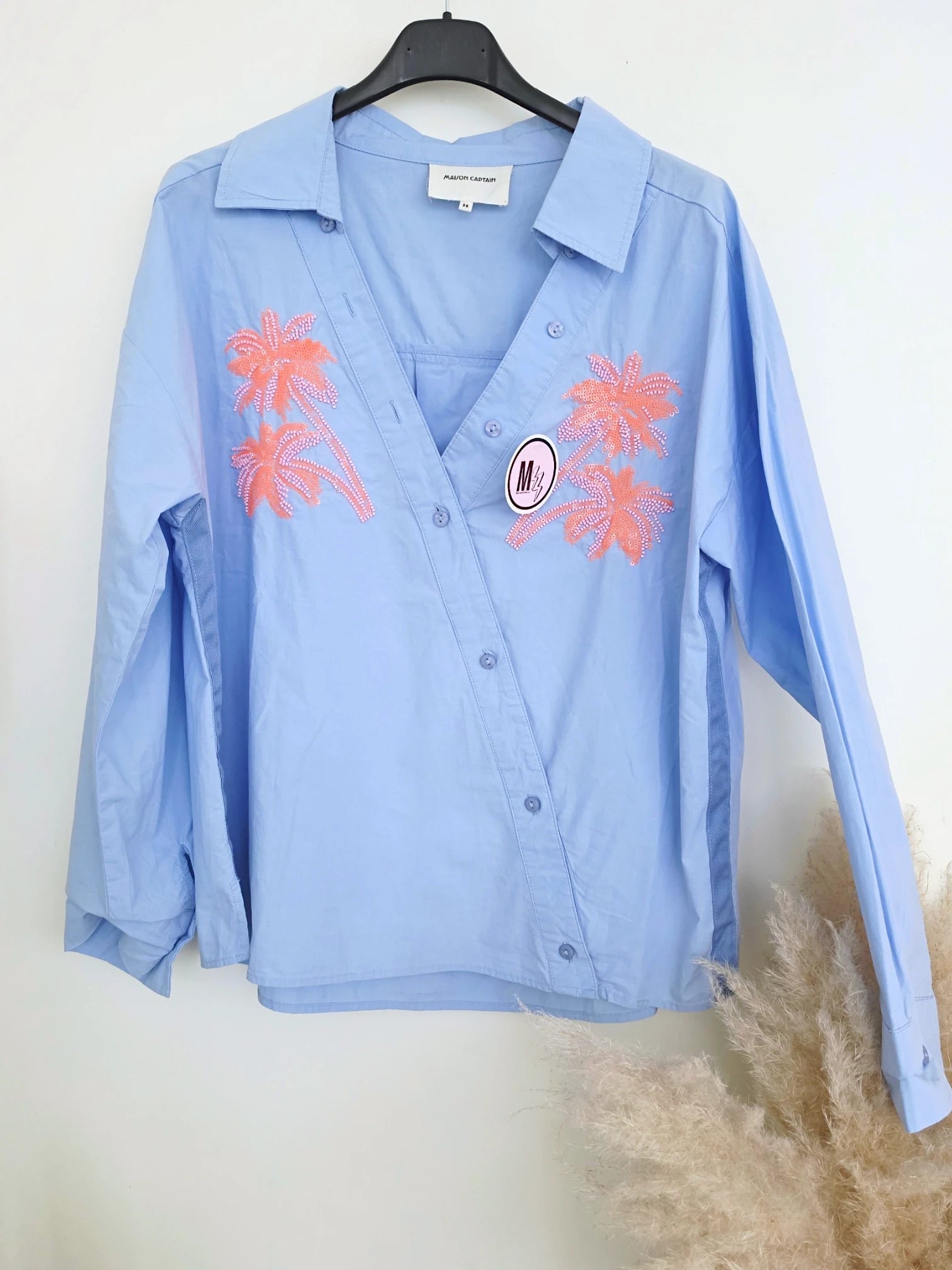 Chemise bleu ciel à palmiers orange fluo