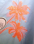 Chemise bleu ciel à palmiers orange fluo