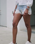 Short bicolore ajouré